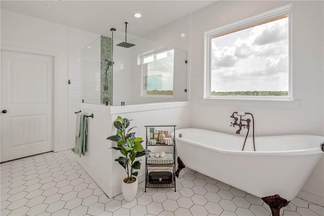 2181 Fm 166, Caldwell, TX 77836 - full bathroom featuring healthy amount of natural light, walk in shower, and a freestanding bath
