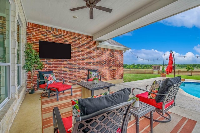 2181 Fm 166, Caldwell, TX 77836 - view of patio / terrace with fence, ceiling fan, and an outdoor pool