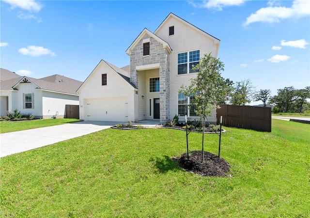 view of front of house with a garage and a front lawn