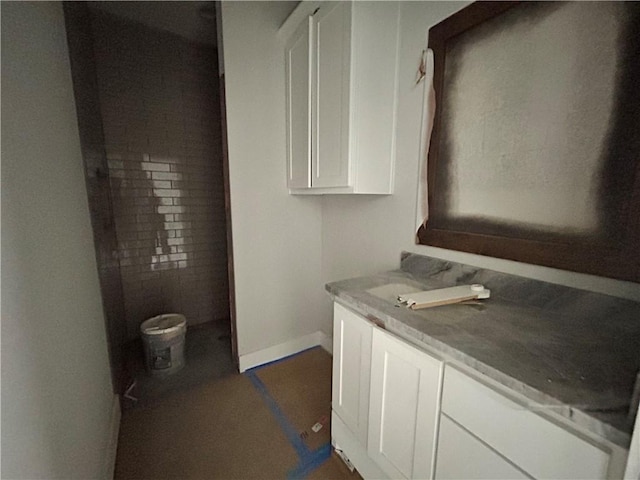 3577 Chantilly Path, Bryan, TX 77808 - bathroom with vanity and baseboards