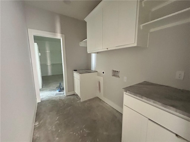 3577 Chantilly Path, Bryan, TX 77808 - laundry room featuring electric dryer hookup, cabinet space, and hookup for a washing machine