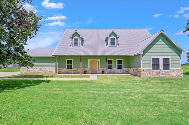 cape cod house with a front lawn and a porch