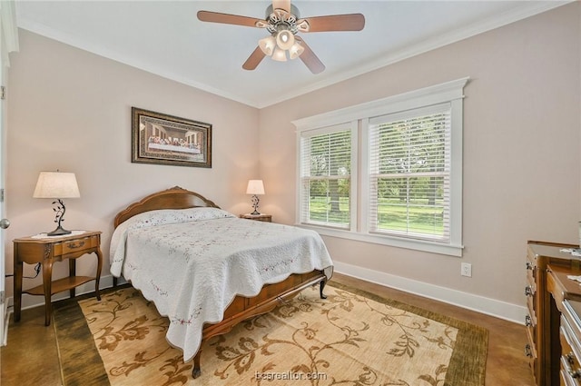 bedroom featuring ceiling fan, crown molding, and dark wood-type flooring