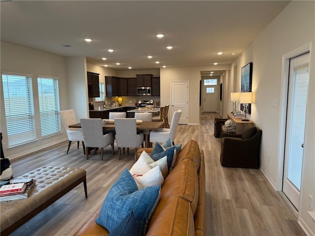 living room featuring light wood-type flooring