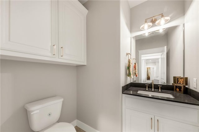 15658 Long Creek Ln, College Station, TX 77845 - bathroom featuring vanity, toilet, and baseboards