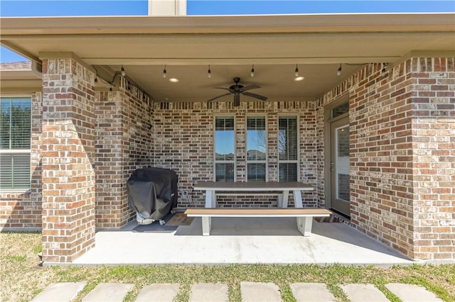 15658 Long Creek Ln, College Station, TX 77845 - view of patio featuring a grill and ceiling fan