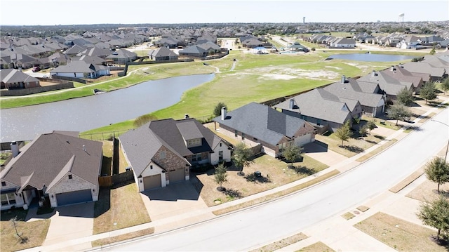 15658 Long Creek Ln, College Station, TX 77845 - drone / aerial view with a residential view and a water view