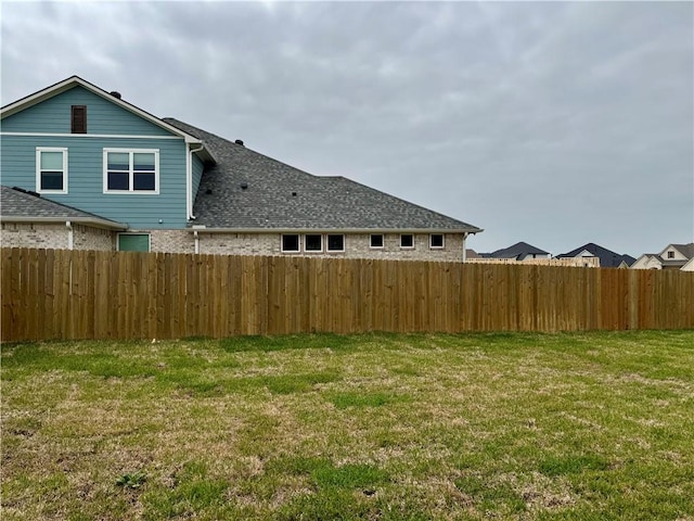 view of yard with fence