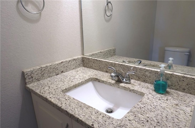 2011 Stubbs Dr, Bryan, TX 77807 - half bath featuring vanity and toilet
