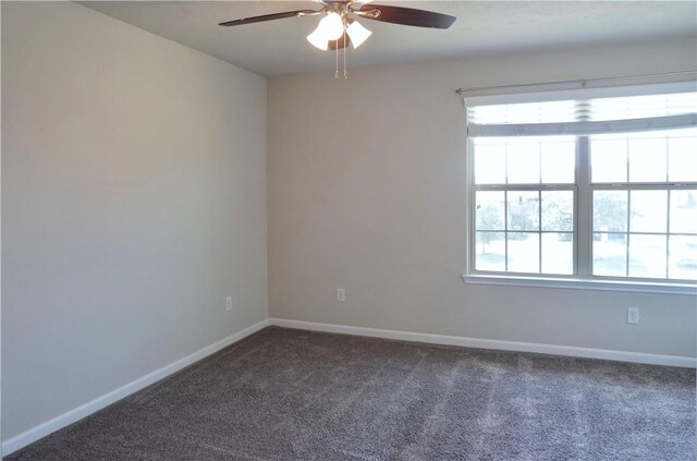 2011 Stubbs Dr, Bryan, TX 77807 - carpeted empty room featuring ceiling fan, plenty of natural light, and baseboards
