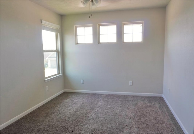 2011 Stubbs Dr, Bryan, TX 77807 - carpeted empty room featuring healthy amount of natural light, ceiling fan, and baseboards