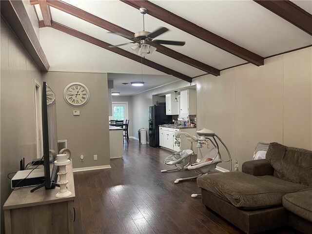 508 Victoria St, Navasota, TX 77868 - living room featuring ceiling fan and dark wood-type flooring