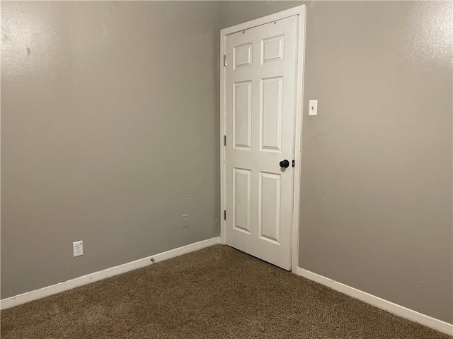 508 Victoria St, Navasota, TX 77868 - unfurnished room featuring dark carpet and baseboards