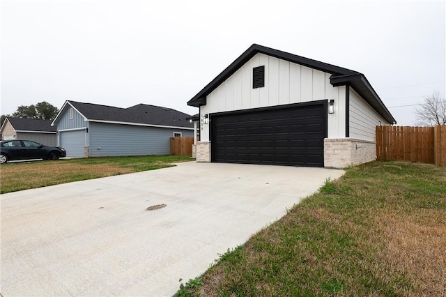 exterior space featuring concrete driveway and fence