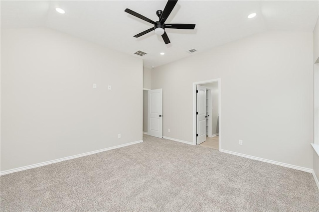 unfurnished bedroom featuring visible vents, baseboards, recessed lighting, vaulted ceiling, and light colored carpet