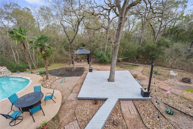 view of yard featuring a gazebo and a patio