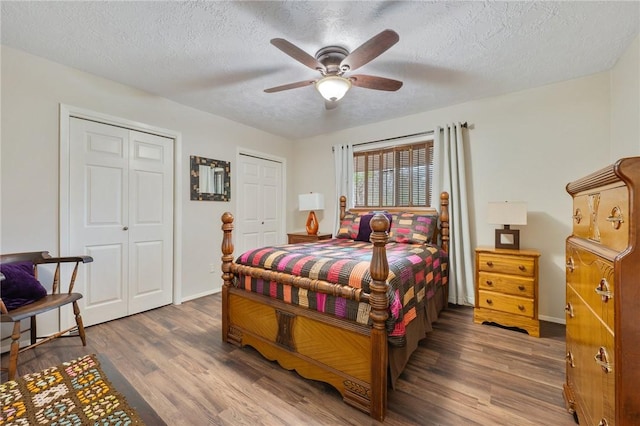 bedroom featuring a textured ceiling, hardwood / wood-style flooring, and ceiling fan