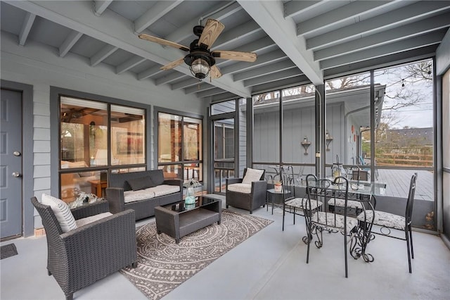 view of patio with an outdoor living space and ceiling fan