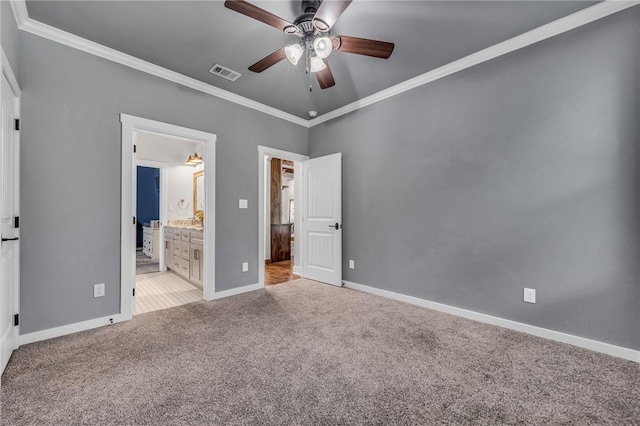 unfurnished bedroom featuring light carpet, connected bathroom, ceiling fan, and ornamental molding