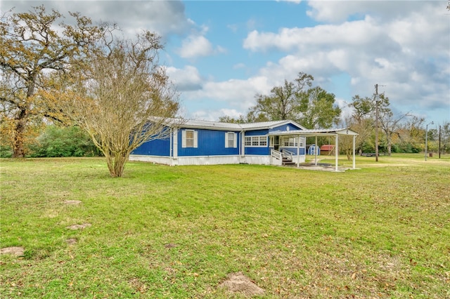 view of front of home with a front lawn