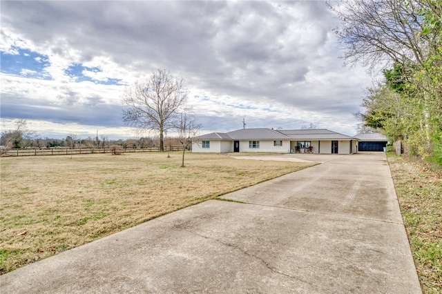 ranch-style house with a front yard