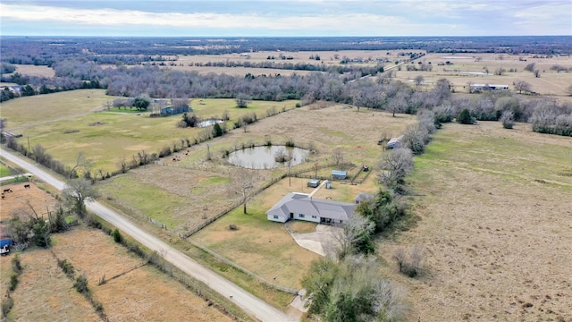 birds eye view of property featuring a rural view