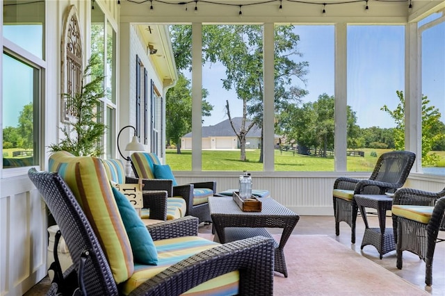 10560 St John Dr, Iola, TX 77861 - sunroom / solarium featuring an outdoor hangout area