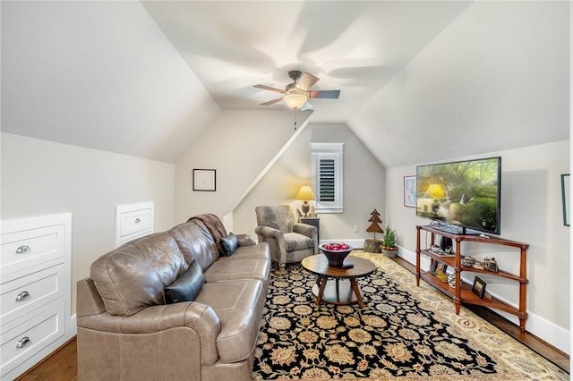 10560 St John Dr, Iola, TX 77861 - living area with ceiling fan, wood finished floors, vaulted ceiling, and baseboards