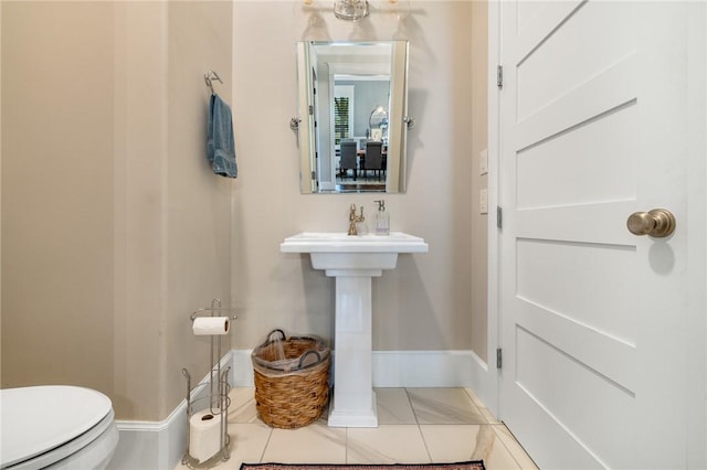 10560 St John Dr, Iola, TX 77861 - half bath featuring toilet and baseboards
