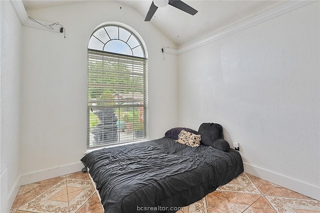 tiled bedroom featuring ceiling fan, lofted ceiling, and crown molding