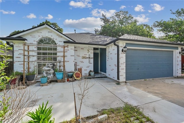 ranch-style home with a garage