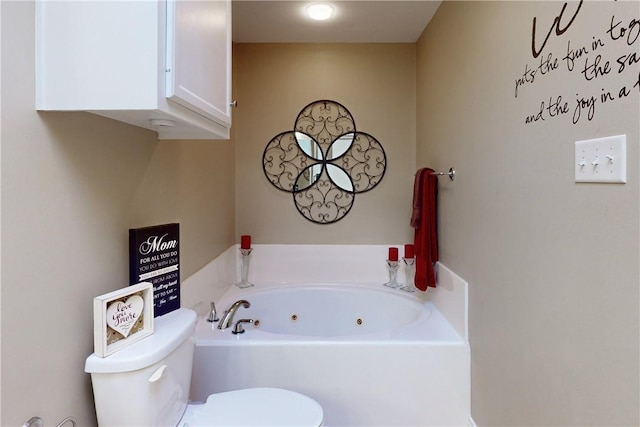 bathroom with a bathing tub and toilet