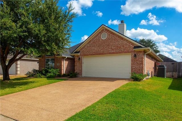 view of front property with cooling unit, a garage, and a front yard