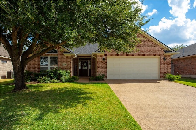 view of front of property with a garage, central AC unit, and a front lawn