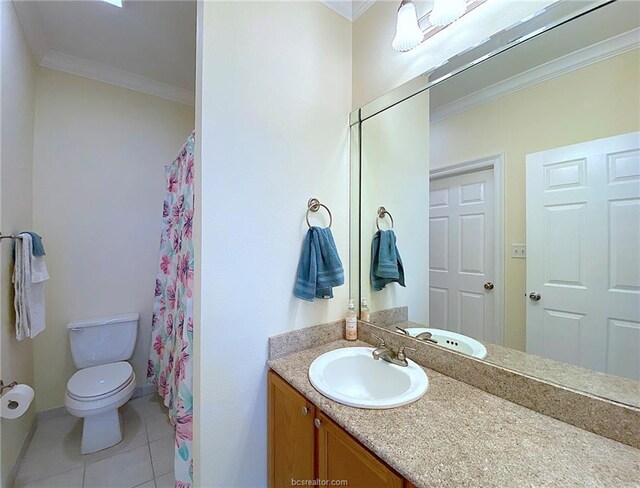 801 Luther St W Unit 401, College Station, TX 77840 - bathroom featuring ornamental molding, toilet, tile patterned flooring, and vanity