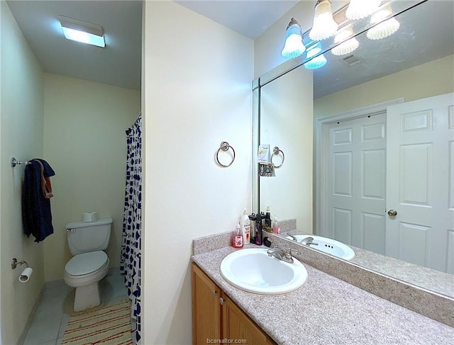 801 Luther St W Unit 401, College Station, TX 77840 - full bathroom with toilet, vanity, tile patterned flooring, and a shower with shower curtain