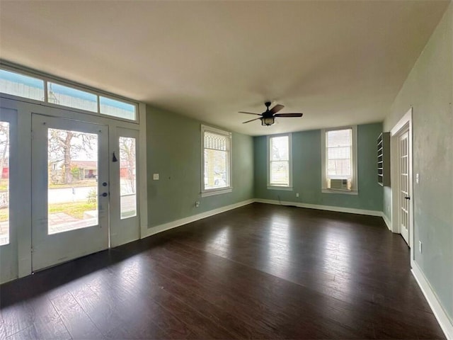 entrance foyer with ceiling fan and dark hardwood / wood-style flooring