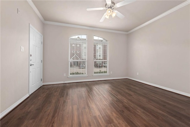 empty room with dark hardwood / wood-style flooring, ceiling fan, and ornamental molding