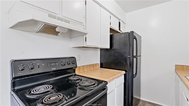 kitchen featuring black appliances, white cabinetry, and hardwood / wood-style floors