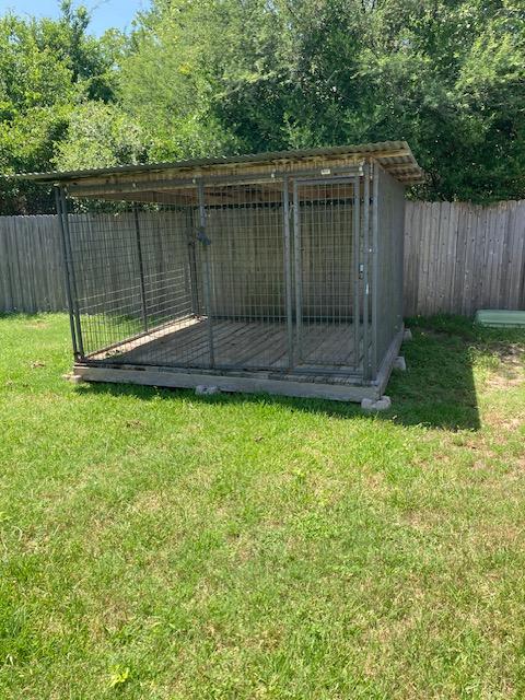 2704 Barronwood Dr, Bryan, TX 77807 - view of outdoor structure featuring a fenced backyard and an exterior structure
