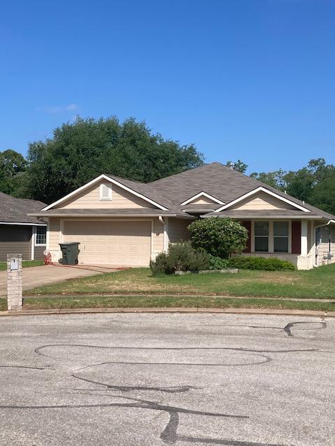 2704 Barronwood Dr, Bryan, TX 77807 - single story home with an attached garage and driveway