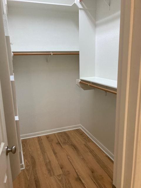 2704 Barronwood Dr, Bryan, TX 77807 - spacious closet featuring wood finished floors