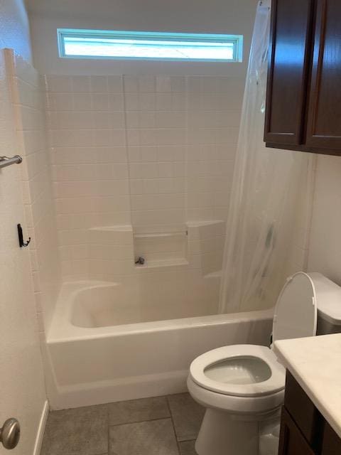 2704 Barronwood Dr, Bryan, TX 77807 - bathroom featuring toilet, vanity, shower / bath combo with shower curtain, and tile patterned flooring