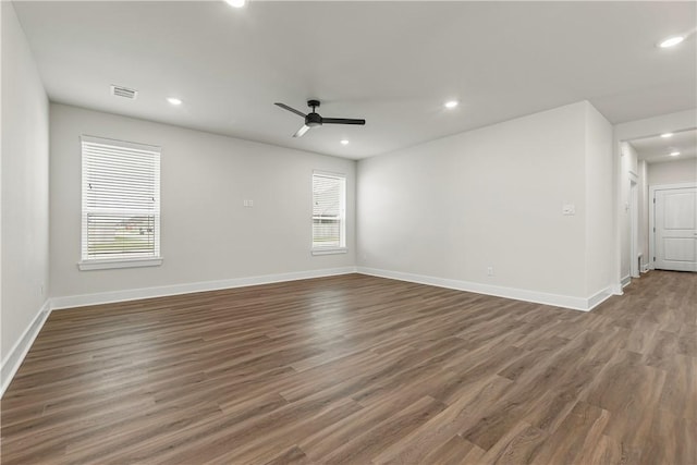 881 Double Mountain Rd, College Station, TX 77845 - spare room with healthy amount of natural light, baseboards, recessed lighting, dark wood finished floors, and ceiling fan