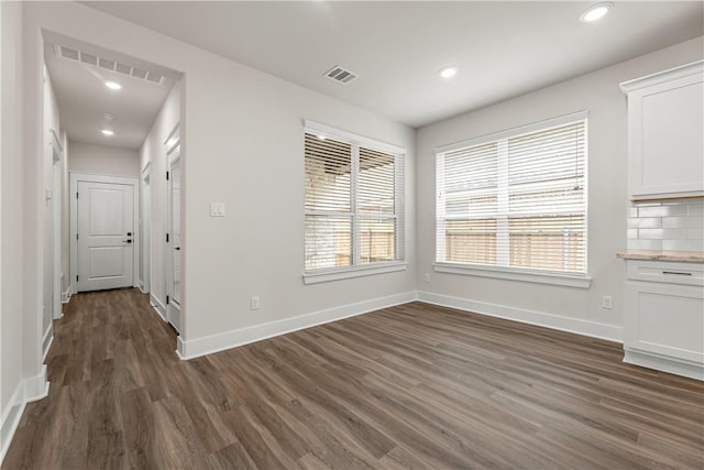 881 Double Mountain Rd, College Station, TX 77845 - unfurnished dining area with dark wood-style floors, baseboards, and recessed lighting