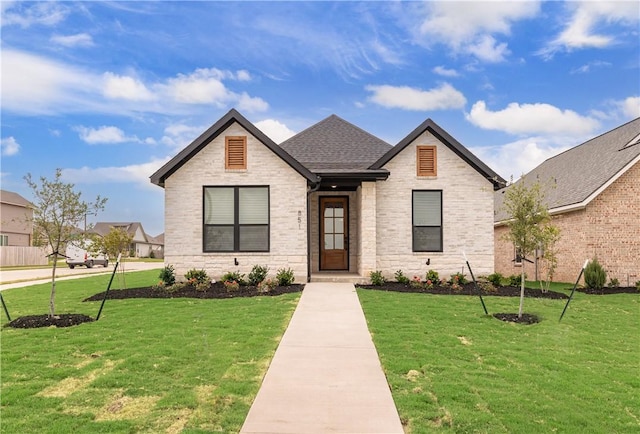 881 Double Mountain Rd, College Station, TX 77845 - view of front of house featuring a front yard and roof with shingles