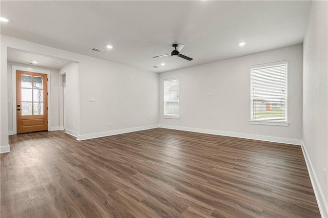 881 Double Mountain Rd, College Station, TX 77845 - unfurnished room with baseboards, dark wood finished floors, ceiling fan, and recessed lighting