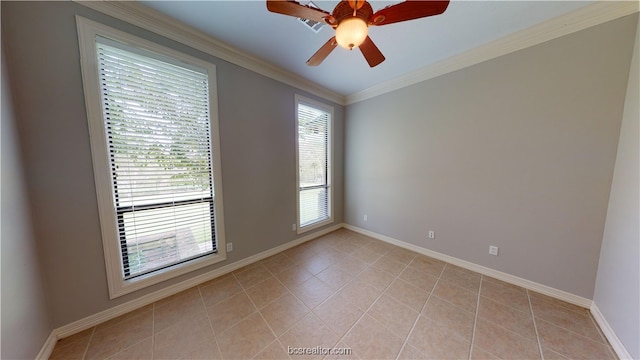 tiled empty room featuring ceiling fan and crown molding