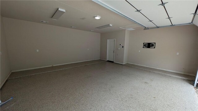 garage with baseboards