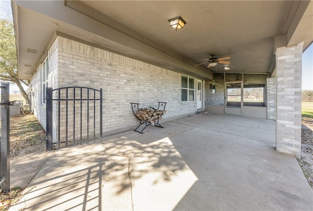 view of patio / terrace featuring ceiling fan